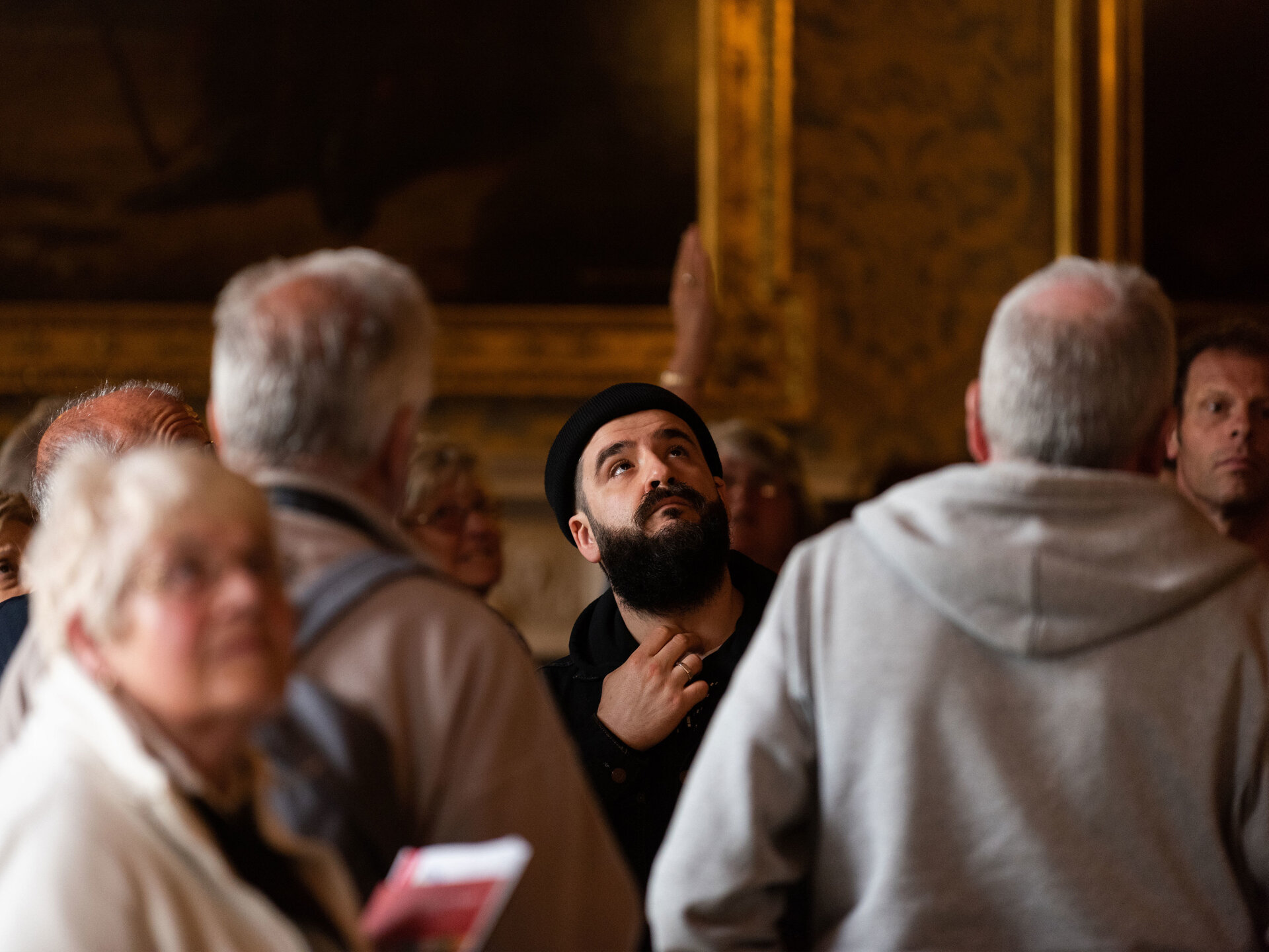 A group of people admiring an interior.