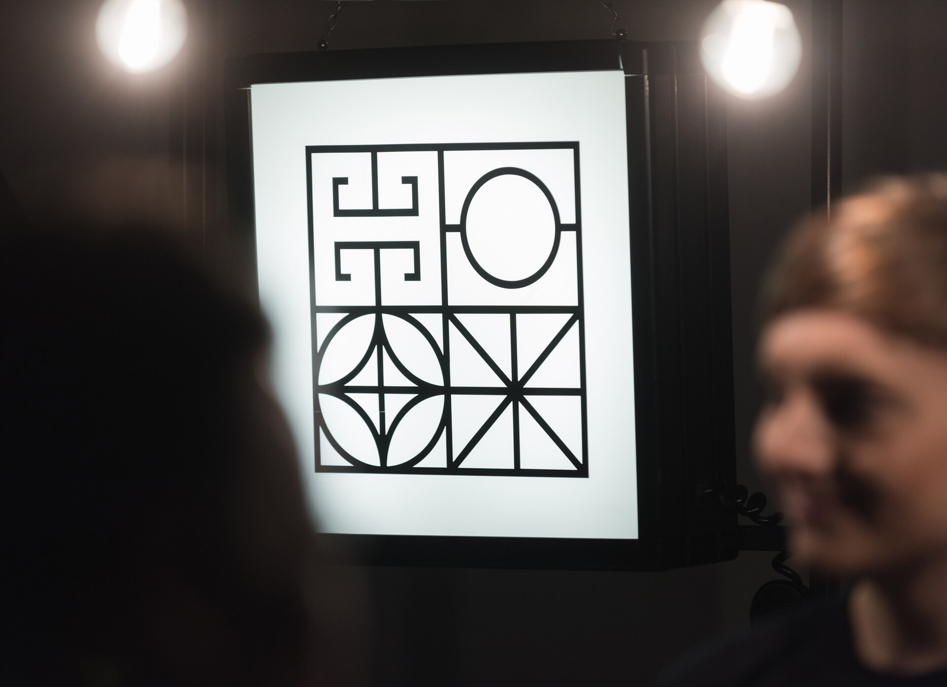 Identity. Signing and bar detail.